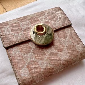 Gucci pink monogrammed wallet